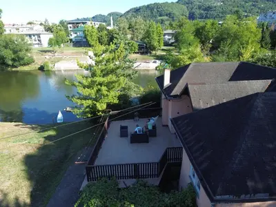an aerial view of a house with a lake at Riverside Panorama Apartment 2 near City Center Brko 2 in Banja Luka