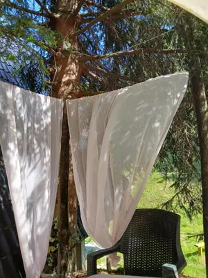 arape hanging over a chair under a tree at Visoko Pyramid VALLEY in Visoko