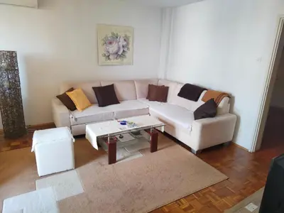 a living room with a couch and a coffee table at Stella in Banja Luka