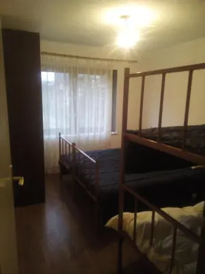 a bedroom with two bunk beds and a window at stidio sa 1 spavaćom sobom SM IK 4 in Tomislavgrad