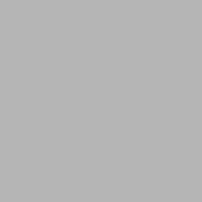 a kitchen with a table with a bowl of fruit on it at Apartman MIŠKO in Bihać