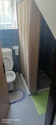 a bathroom with a toilet and a shower at Holiday home una in Bosanska Krupa