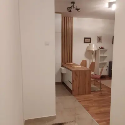 a living room with a desk and a chair at Ela in Banja Luka