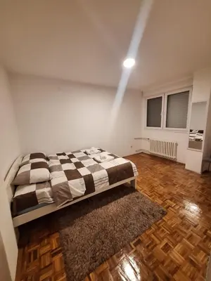 a bedroom with a bed in a room at Vrbas in Banja Luka