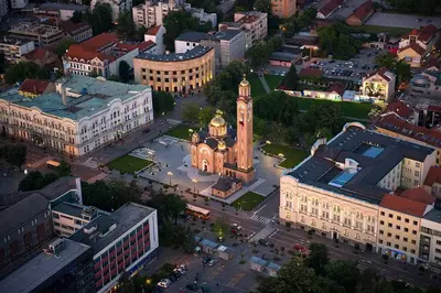 an aerial view of a city with a clock tower at Park apartment in Banja Luka