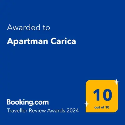 a yellow box with the text awarded to aprilarianaria at Apartman Carica in Visoko