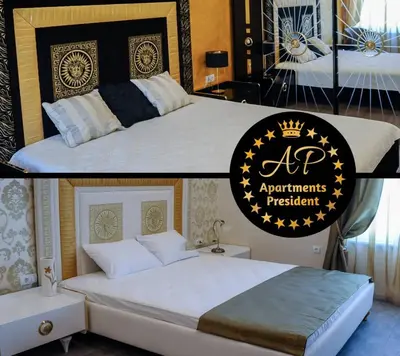 a bedroom with a king sized bed with a sign on it at Apartmani President III in Banja Luka